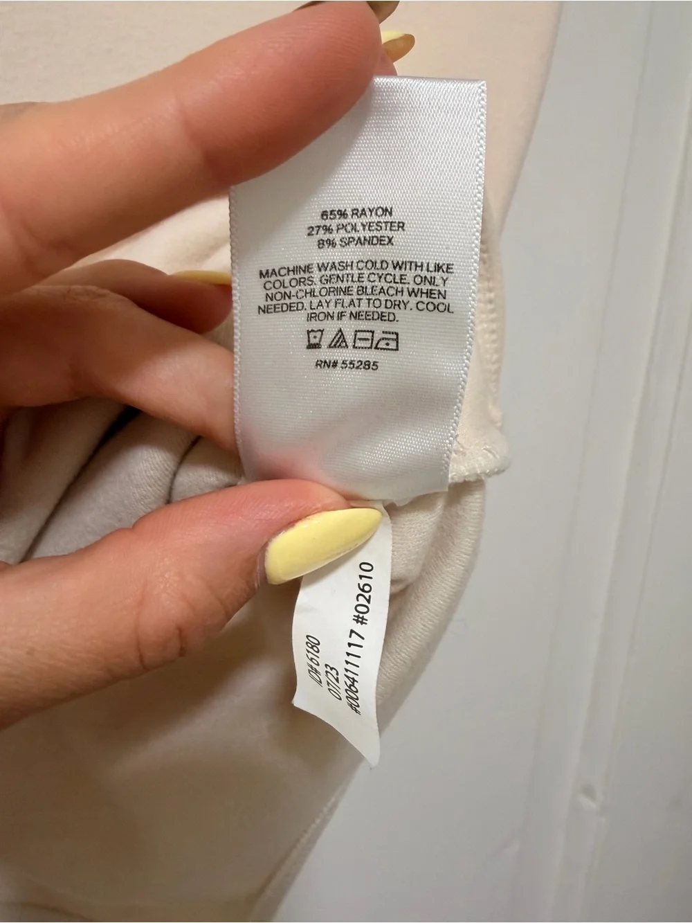 Sleeveless Mock Neck One-Piece Bodysuit in Cream